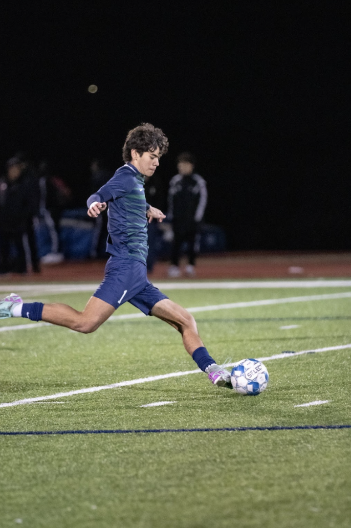 Sebastian Bustamante taking a penalty kick against the Lone Star High School junior varsity boys soccer team. Both the varsity and junior varsity teams have been working hard to make Reedy boys soccer history.